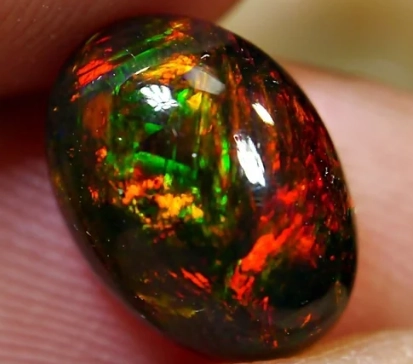 Black Fire Opal Guide: Value, Buying Tips & Mystical Properties